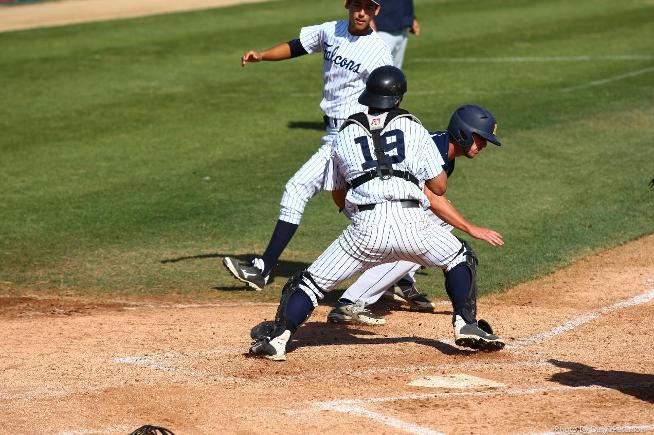 File Photo: C Chris Carrillo (19) made several strong defensive plays, including a key caught stealing in the ninth, to help secure the Falcons win