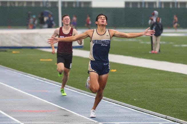 Anthony Lozano celebrates winning the 1500 meters at the SCC Championships
