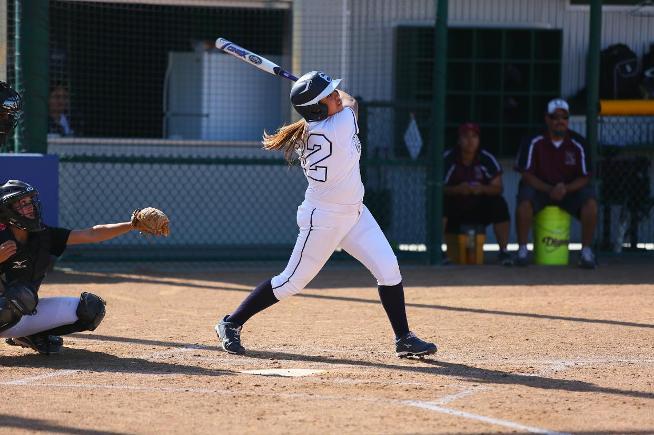 Crystal Cano hits her first of two home runs - including the game-winner - in the Falcons 9-8 win
