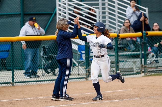 Marley Manalo celebrates the first of her two home runs in a DH against LA Mission