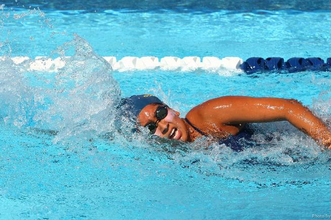 The women's swimming team won a pair of events in their conference meet