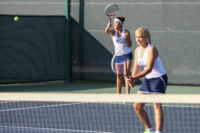 File Photo: (L-R) Stef Flores and Anatastasia Khomyachenko won their doubles match