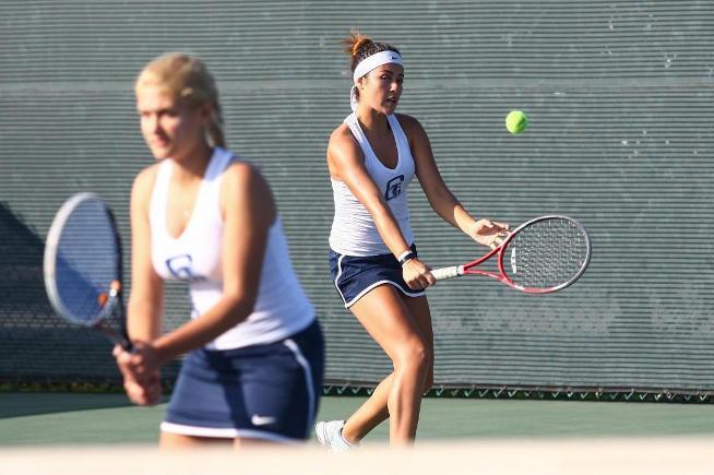 Anastasia Khomyachenko (forefront) and Stef Flores (background) posted an 8-0 doubles win for the Falcons