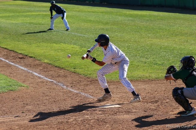 Nate Gardenswartz lays down a bunt for one of his two hits on the day