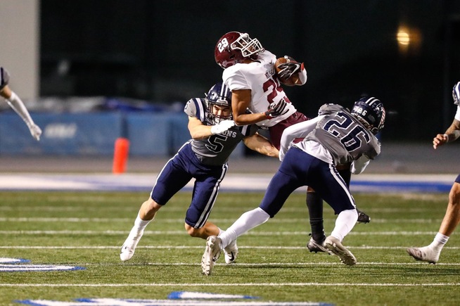 Milo Lopez (5) makes one of his 15 tackles for the Falcons against Mt. SAC