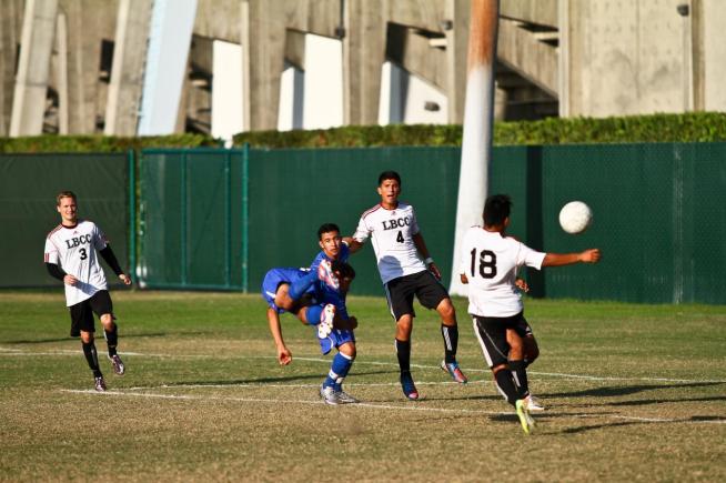 A diving Dominic Escobar scores the first goal in a 5-0 win over Long Beach City.