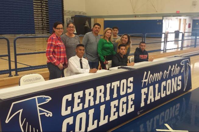 Players from the Cerritos men's soccer team with their families