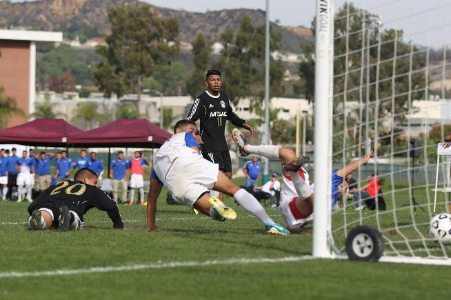Connor Johnson scores the Falcons third goal in their 3-1 win over Mt. SAC for the CCCAA State Championship