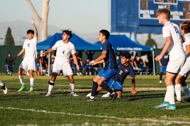 Antonio Negrete (standing) chips in the game-winning goal for the Falcons