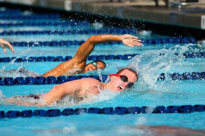 File Photo: Joshua Owens (far) won three individual races and one relay race to help the Cerritos men's swimming team defeat both Pasadena City and LA Trade-Tech