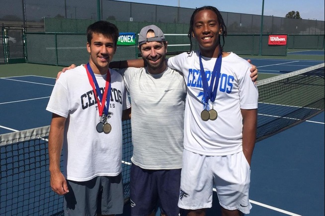 (L-R) Victor Castro, head coach Quinn Caldaron and Kent Hunter celebrate after the pair won the conference doubles championship