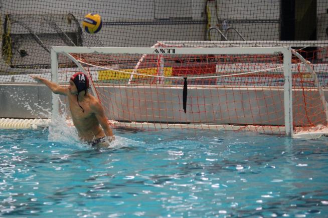 GK Coleton Perez makes one of his eight saves in the Falcos 14-13 OT win over College of Notre dame (ID) on Saturday.