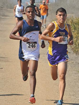 Munir Kahssay (246) battles with Omar Cortes of LA Trade-Tech at the SoCal Championships. Kahssay came in second place overall.
