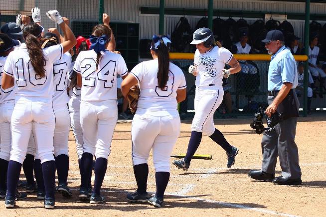 Krystal Purkey (23) blasted a three-run home run abd played solid defense behind the plate to help Cerritos defeat Cypress, 8-2