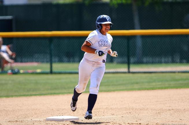 Jenny Navarro rounds the bases after her first inning home run