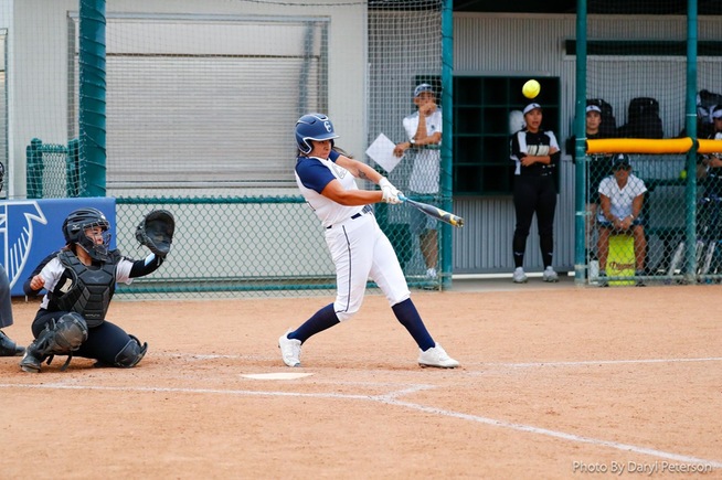 Chasity Martinez makes contact on her game-winning home run
