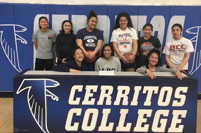 Alyssa Salgado (seated, center) signed with Life Pacific College