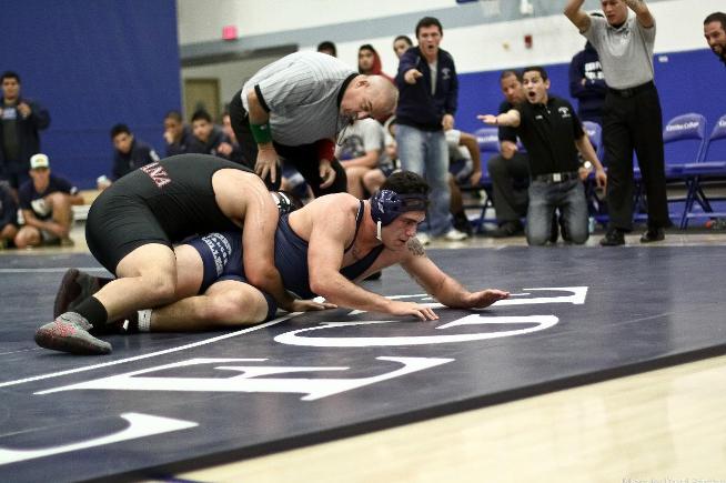 The Cerritos wrestling team pulled out an 18-14 win over Santa Ana