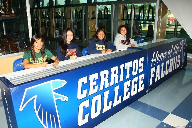 (L-R) Jasmine Cornejo, Alyssa Cabral, Claudia Lopez and Jennifer Torres sign their letters of intent with four-year schools