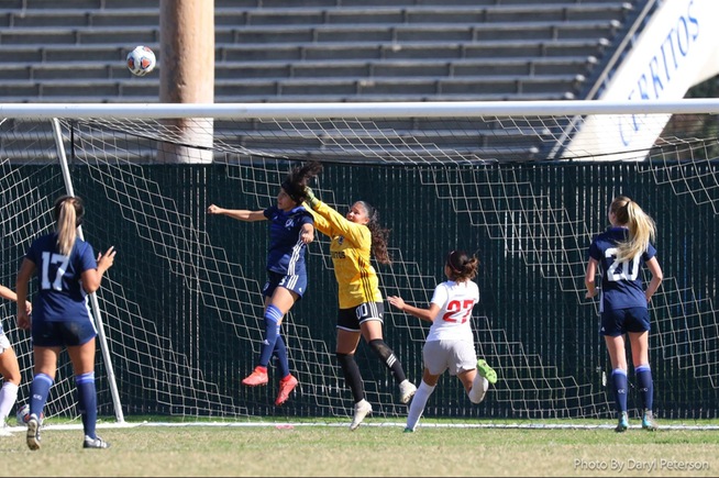 America Ontiveros (black headband) was one of three Falcons named 1st Team All-Conference