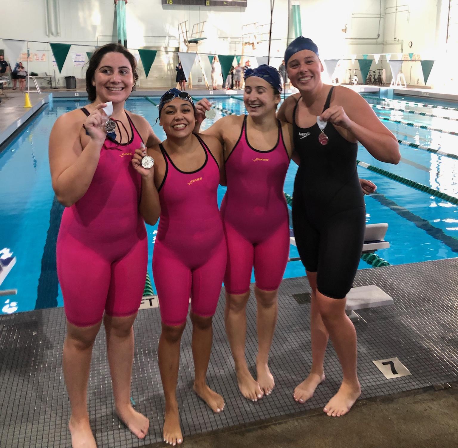 (L-R) The 400-yard freestyle relay team of Jillian Crockett, Karina Oliveros, Isabella Berdote and Samantha Wisher came in third place