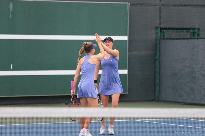 (L-R) Petra Such and Moa Lindstrom celebrate their doubles win
