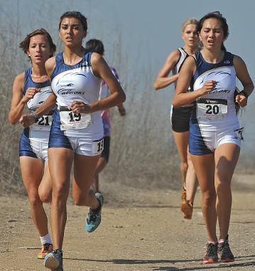 Cerritos women's cross country team running in a group at the SoCal Championships, where the Falcons came in fourth place.