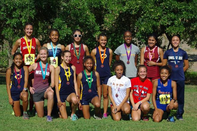 Stephanie Ruiz (back row; second from left) and Ariel Melendez (back row, far right) helped the women's cross country team come in third place