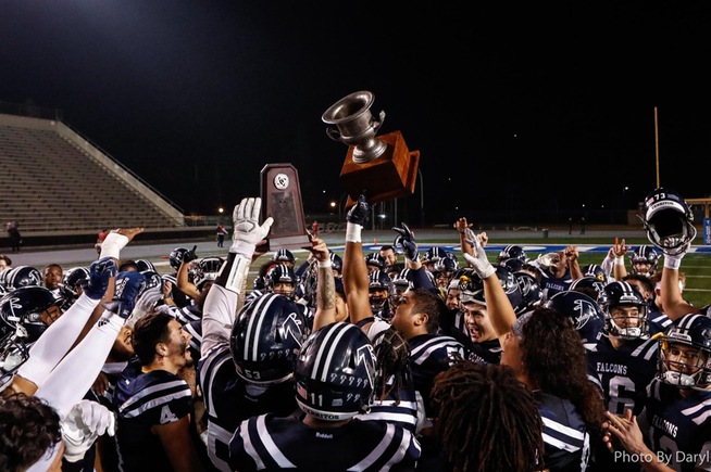 Falcons raise both the Western State Bowl trophy and Crosstown Cup after defeating LBCC