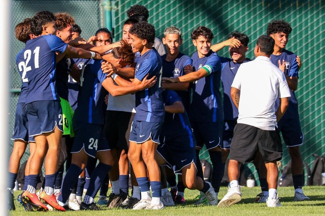 Falcons celebrate with Halmar Carranza (24), who scored the third goal of the day for Cerritos