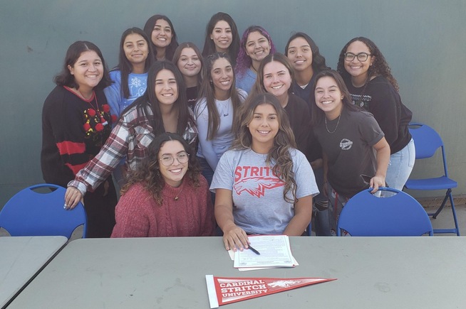 Cerritos softball teammates join Danielle Rivera during her signing