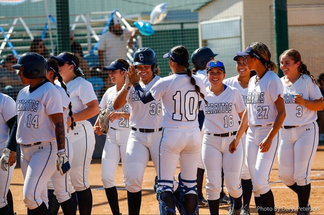 Jimena Velazquez (36) is greeted by her teammates after hitting her team-leading fifth home run of the season