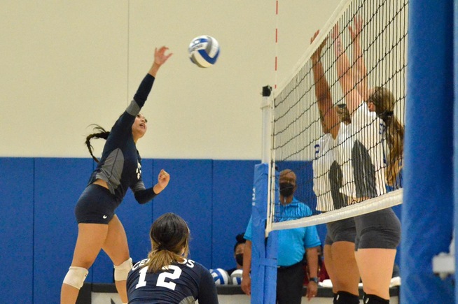 Aiyana Sierra (13) slams home one of her seven kills in the Falcons win