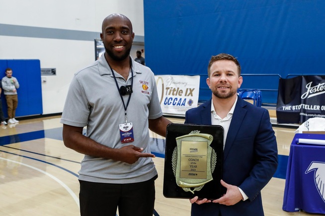 Dustin Kirk (right) was named the South Coast Conference Women's Coach of the Year